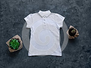 White blank polo t-shirt mockup on dark background. Blank cotton plain shirt collar pocket template for creative design