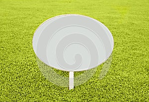 white blank sign on grass