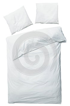 White blanket and pillows