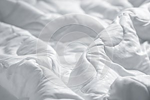 White blanket. Wrinkle messy blanket in bedroom after waking up in the morning. Bed details.