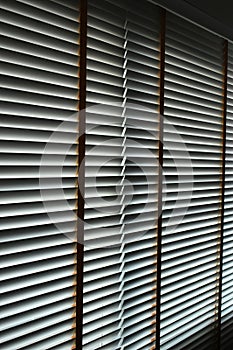 white blinds curtain put on the window, interior design