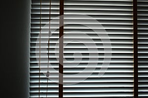 white blinds curtain put on the window, interior design