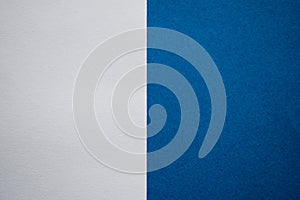 White and blue abstract background divided vertically