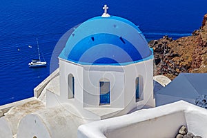 White and blue architecture of Oia village on Santorini island, Greece