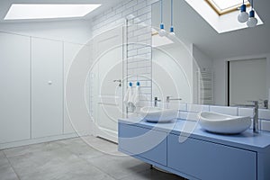 White and blue bathroom interior