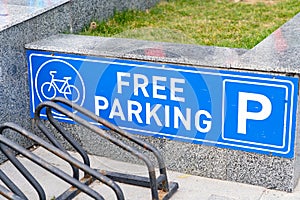 White blue bicycle parking road sign and free stop places