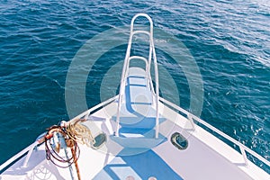 White and Blue Boat Bow and Pullpit with Rusty Anchor and Blue S