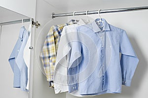 White, blue and checkered clean ironed men's shirts