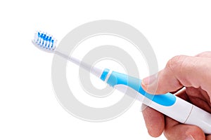 white blue Electric toothbrush in hand is included isolated on a white background