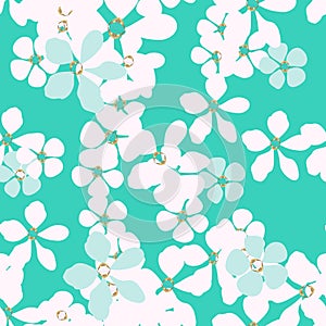 Abstract white and blue flowers with gold core on turquoise background.