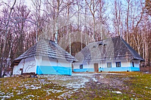 The white-blue hata houses of Bukovyna Region, Pyrohiv Skansen, Kyiv, Ukraine photo