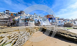 White and blue houses on the beach at imsouane in morocco