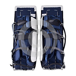 White and blue ice hockey goalie protective leg pads isolated on white background
