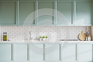 White and blue kitchen with countertops