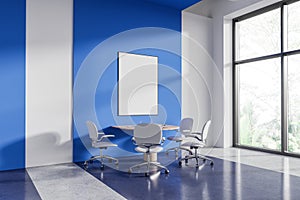 White and blue office board room corner with poster