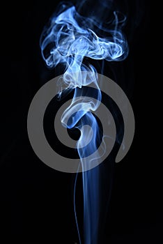 White and blue smoke on black background with abstract texture