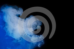 White blue smoke smoker cloud from hookah on black background