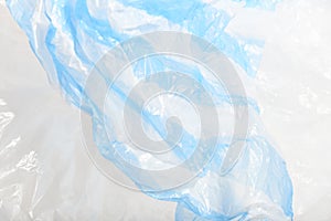 White and blue wrinkled plastic bag. Concepts: sustainability, recycling