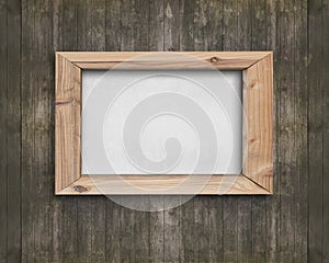 White board with wooden frame on old brown wood wall