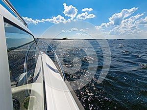 White boat at blue sea. Relaxing vacation, travel and sea concept