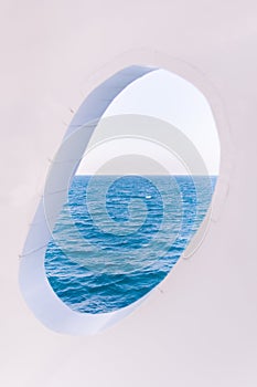 White Boat Crackled Window on Blue Sea and Sky