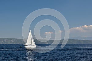 White boat on open blue sea, Croatia