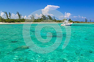 White boat on the turquise Caribbean Sea