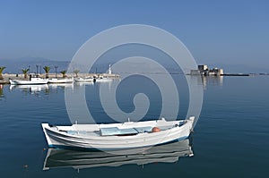 White boats and and Bourtzi fortress in Nafplio, Peloponnese