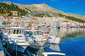 White boats in small cosy port on Greek Island