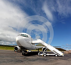 White Boeing 767 Private Jet with airplane Stairs