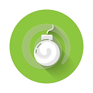 White Bomb ready to explode icon isolated with long shadow. Green circle button. Vector
