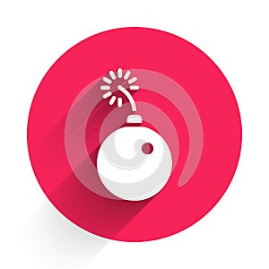 White Bomb ready to explode icon isolated with long shadow. Red circle button. Vector