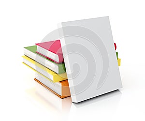 White book leaned on multicolored books tower, isolated on white background