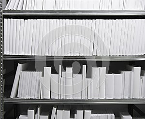 White books in a shelf