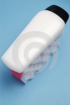 White bottle on bath sponge