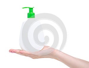 White bottle soap with dispenser in hand