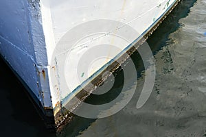 White bow of wooden ship.