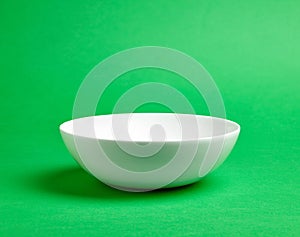 White bowl on colorful background