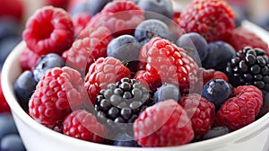 White Bowl Filled With Berries and Raspberries