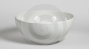 A white bowl with a smooth surface and a slightly curved shape.