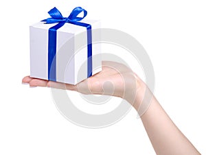 White box with blue ribbon bow gift in hand