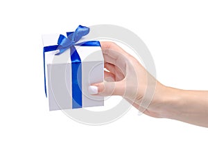 White box with blue ribbon bow gift in hand