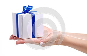 White box with blue ribbon bow gift in hand