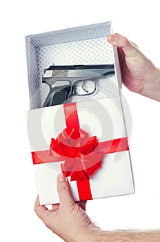White a box a gift about the pistol