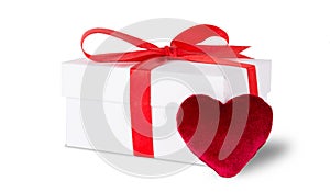 White box with red heart bow and ribbon isolated on white background