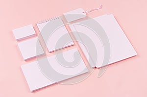 White branding stationery, mock up scene on light soft pastel pink background, blank objects for placing your design.