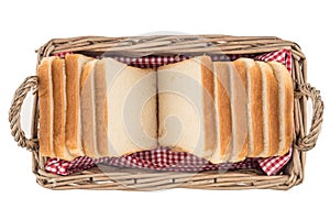 White bread in basket. Slice. Isolated on white background.