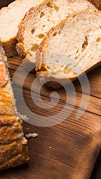 White bread sliced on a chopping Board close-up,with space