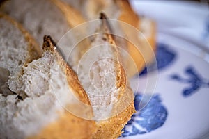 White bread slices, wheat bread on the plate.