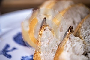 White bread slices, wheat bread on the plate.